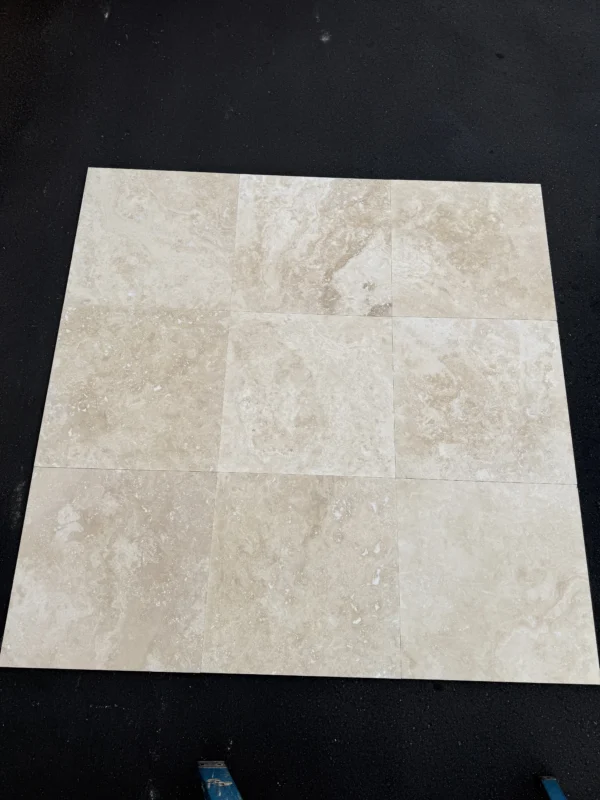 ivory-alabastrino-travertine-18x18-cross-cut-68d93a6b9085.webp