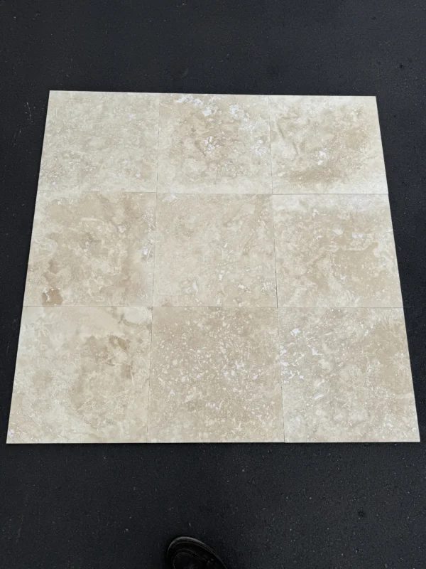 ivory-alabastrino-travertine-18x18-cross-cut-93383f94290d.webp