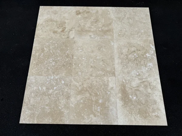 ivory-alabastrino-travertine-18x18-cross-cut-9d6809a951c5-1.webp