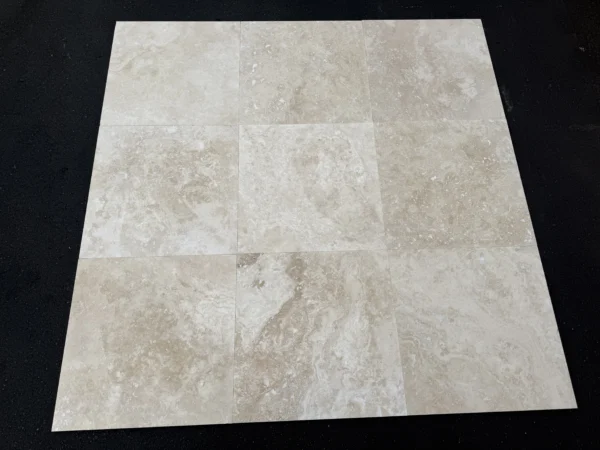 ivory-alabastrino-travertine-18x18-cross-cut-a50e9d925adb.webp