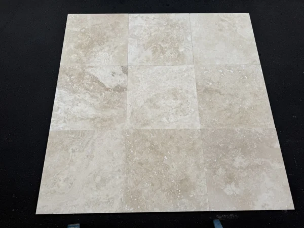 ivory-alabastrino-travertine-18x18-cross-cut-cbe493617bc1.webp