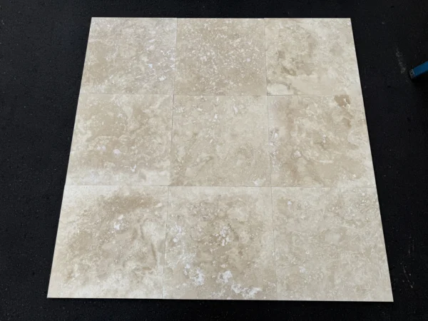 ivory-alabastrino-travertine-18x18-cross-cut-fb6642fc89d7.webp